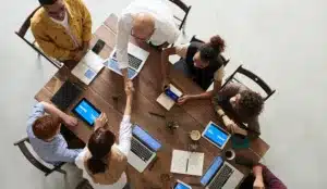 Group of people in a hybrid meeting