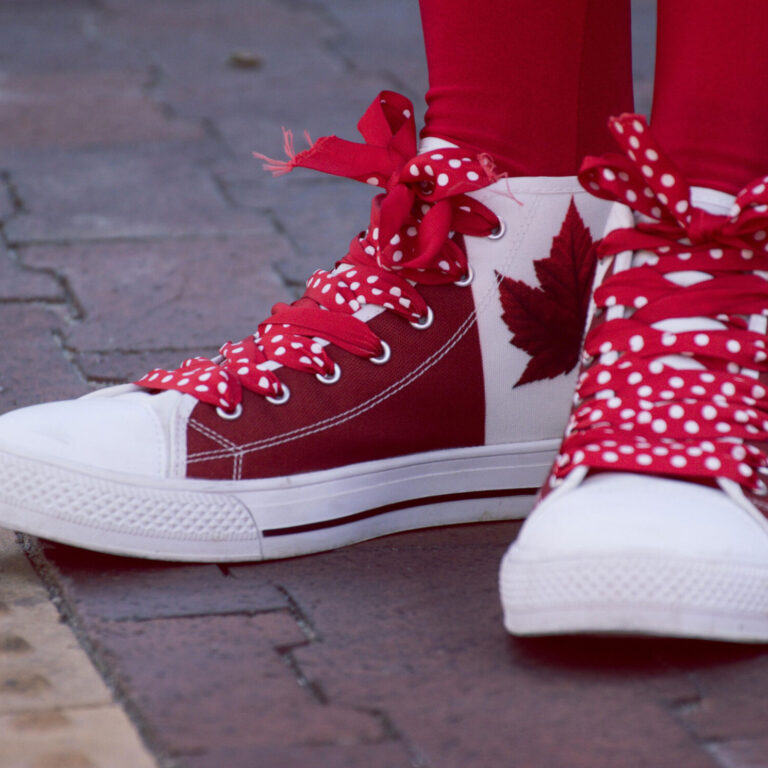 Shoes with Canadian flag print on them