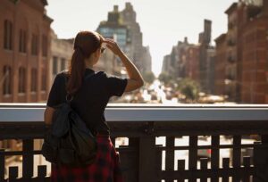 Expatriate traveler looking over a new city