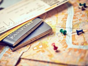 A map and passports and tickets in preparation for relocation