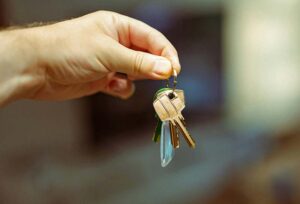 Rental keys being passed to a new tenant