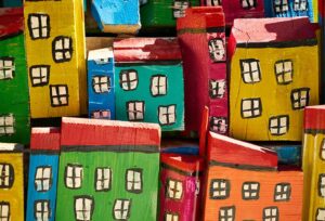 Pieces of wood, coloured like small city houses