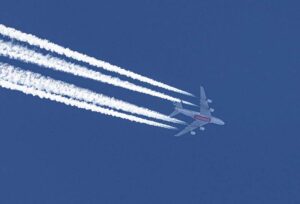 Airplane with contrails