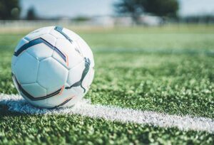 Soccer ball sitting on a soccer field